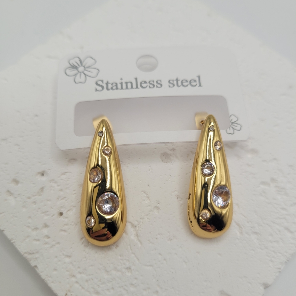 Set aretes y brazalete